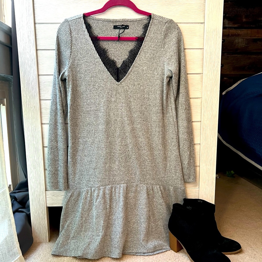 Reserved dress, size medium. Never worn.